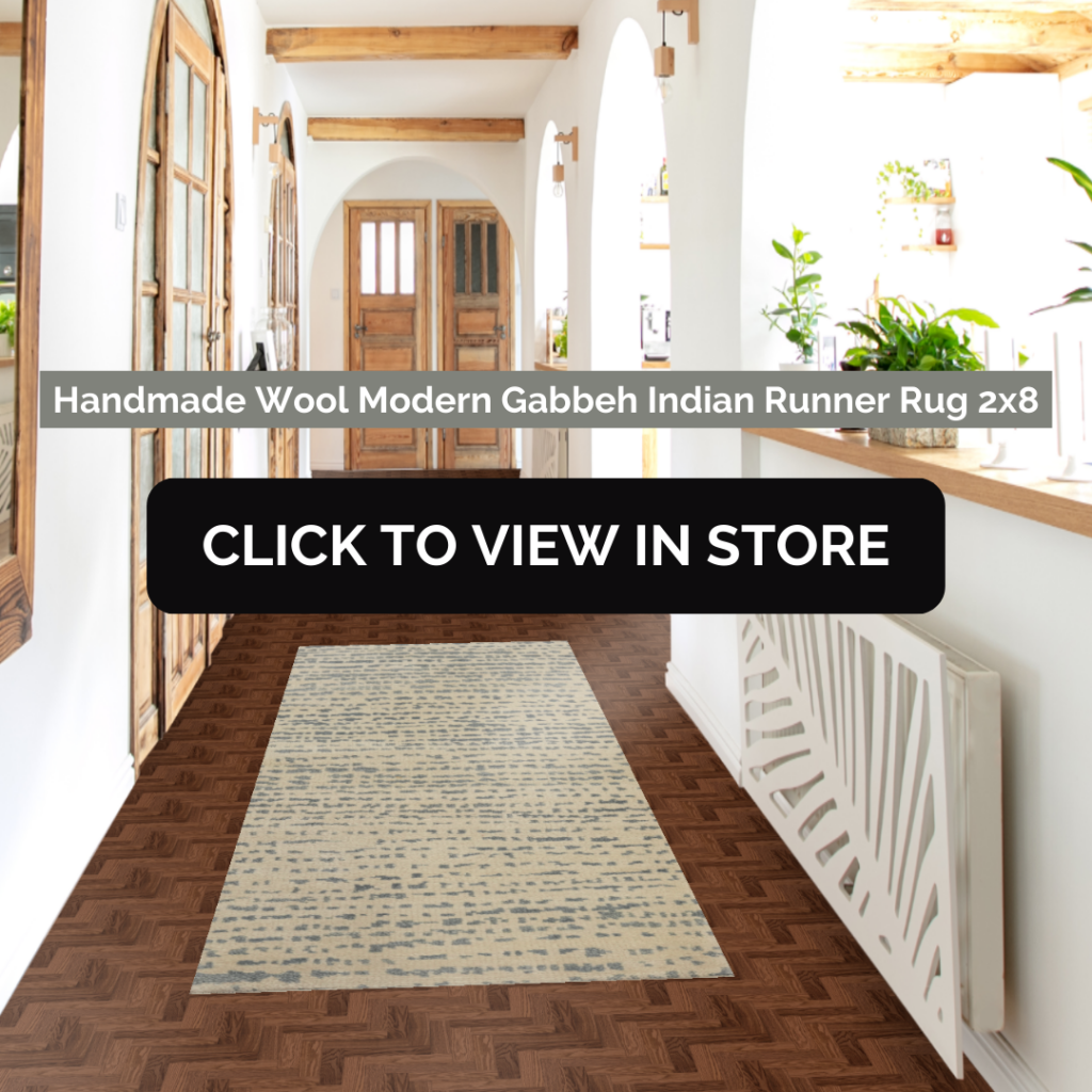 Bright hallway with natural light highlighting a 2x8 Handmade Wool Modern Gabbeh Indian Runner Rug. The rug features a minimalist design in neutral tones, perfectly complementing the rustic wood doors and white arched walls, creating a harmonious blend of modern and traditional elements.